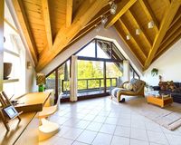 DG-Appartement mit sichbaren Dachbalken